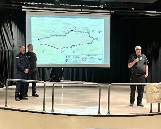 Fire Chiefs Rogers, Shirlaw, and Ware presenting at the Conifer Town Hall. Phoot by Canyon Courier