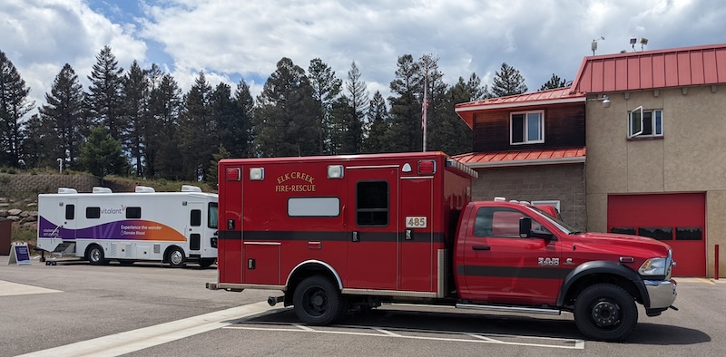 Elk Creek Fire ambulance and Vitalant blood donation RV at Station 1