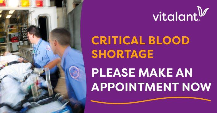 Paramedics loading patient into ambulance. Vitalant requesting blood donations to alleviate critical shortage.