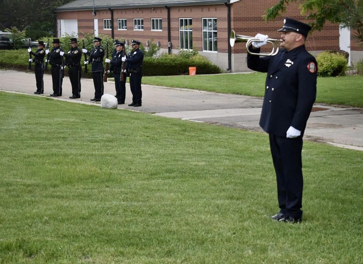 Elk Creek Firefighter playing trumpet at the Colorado Professional Fire Fighters Honor Guard Academy